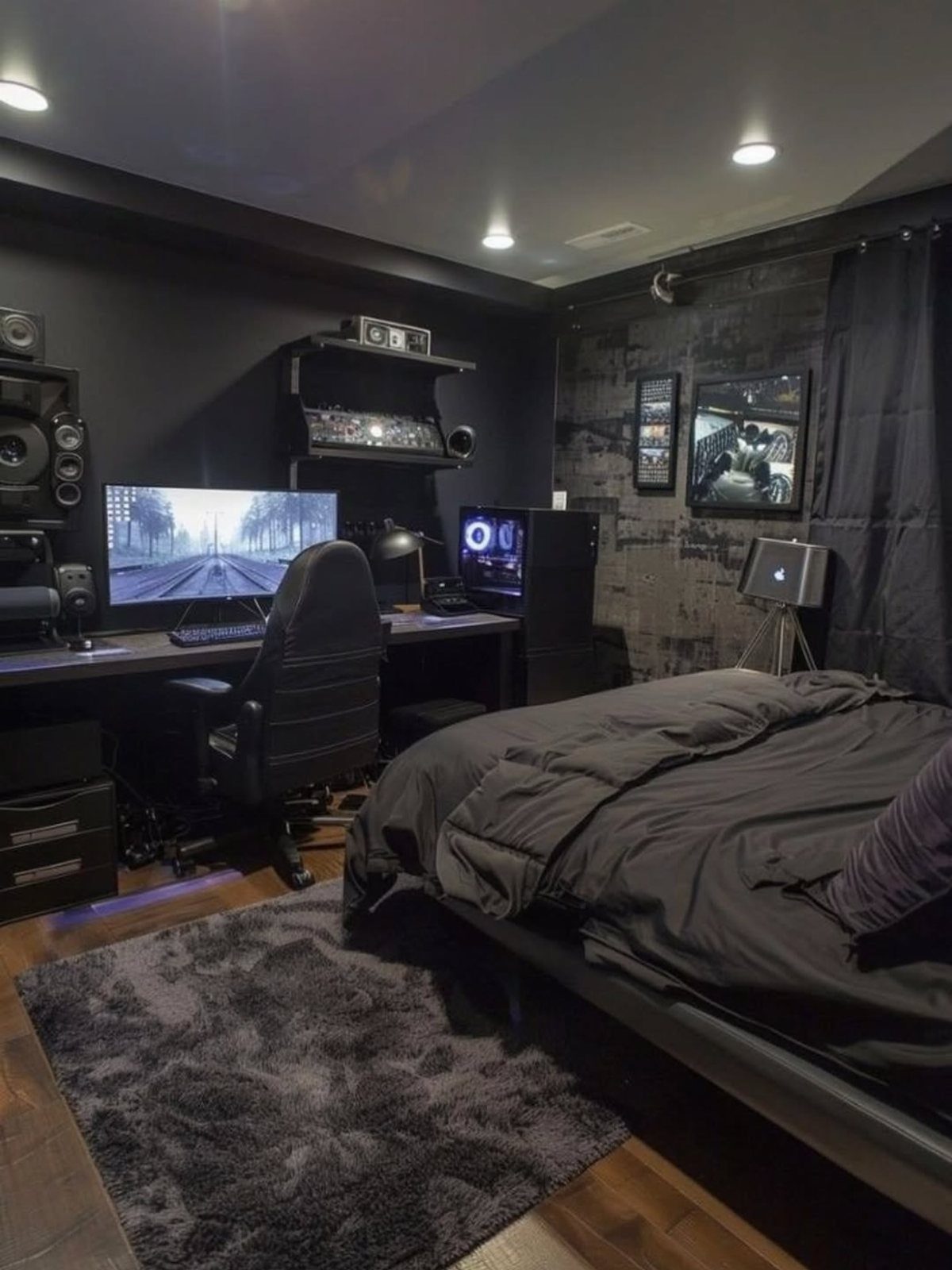 Gaming setup with monitor and PC tower in a dark modern bedroom